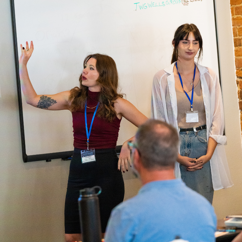 two women leading a presentation